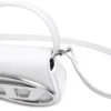 1dr xs 1DR XS – Iconische minitas met D-logoplaatje